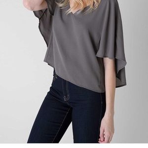 Gray loose crop top, open back